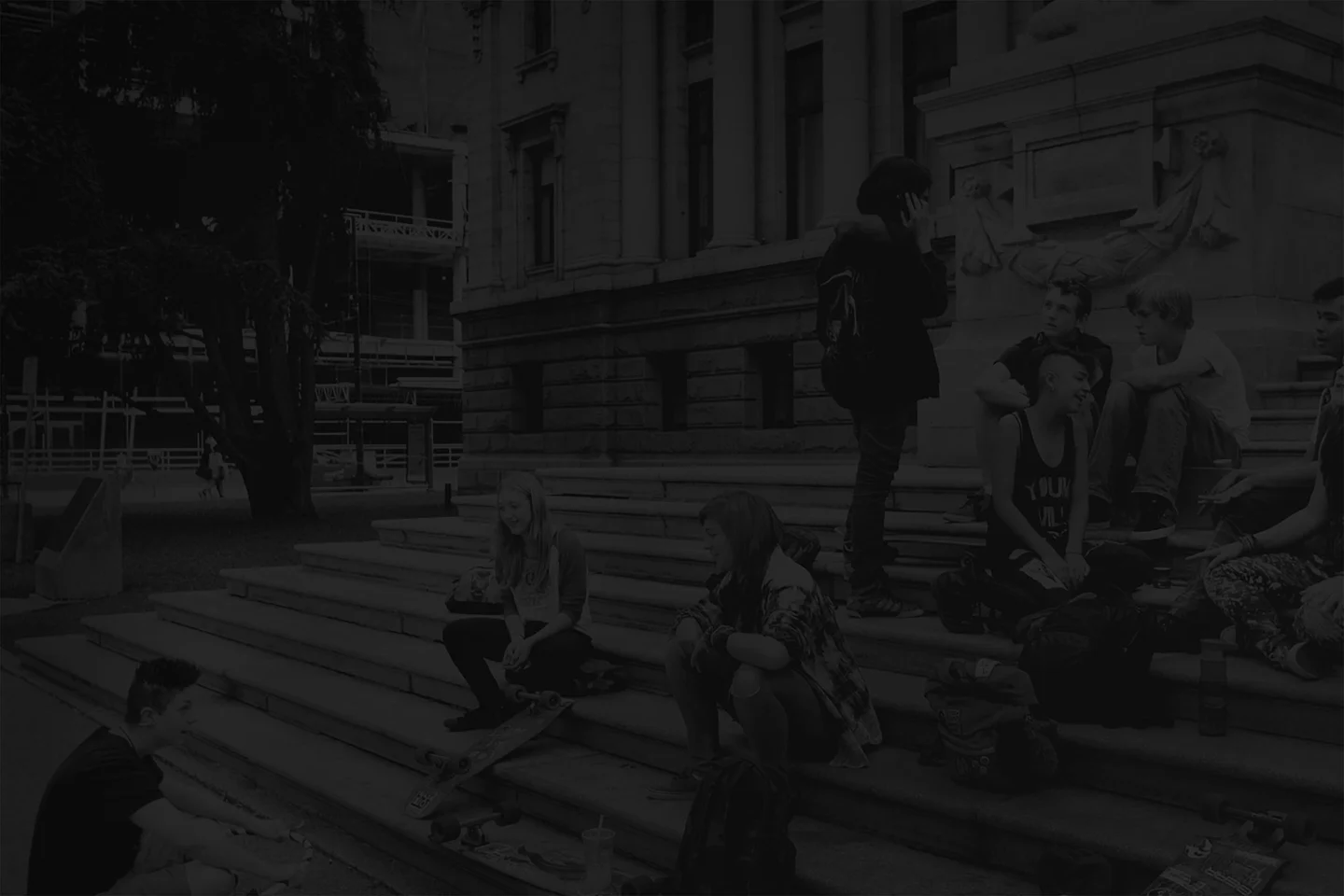 A group of students hanging out on the steps of the Vancouver Art Gallery